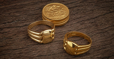 Four 22ct sovereigns, the original 9ct ring, and the finished piece — before the story begins.