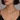 Gold fringe necklace on model showing pectoral design