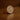 Half gold sovereign on wood background