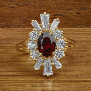 Recreated jewellery design from a photograph. A garnet ring re-designed from an old photo.