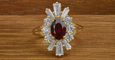 Recreated jewellery design from a photograph. A garnet ring re-designed from an old photo.