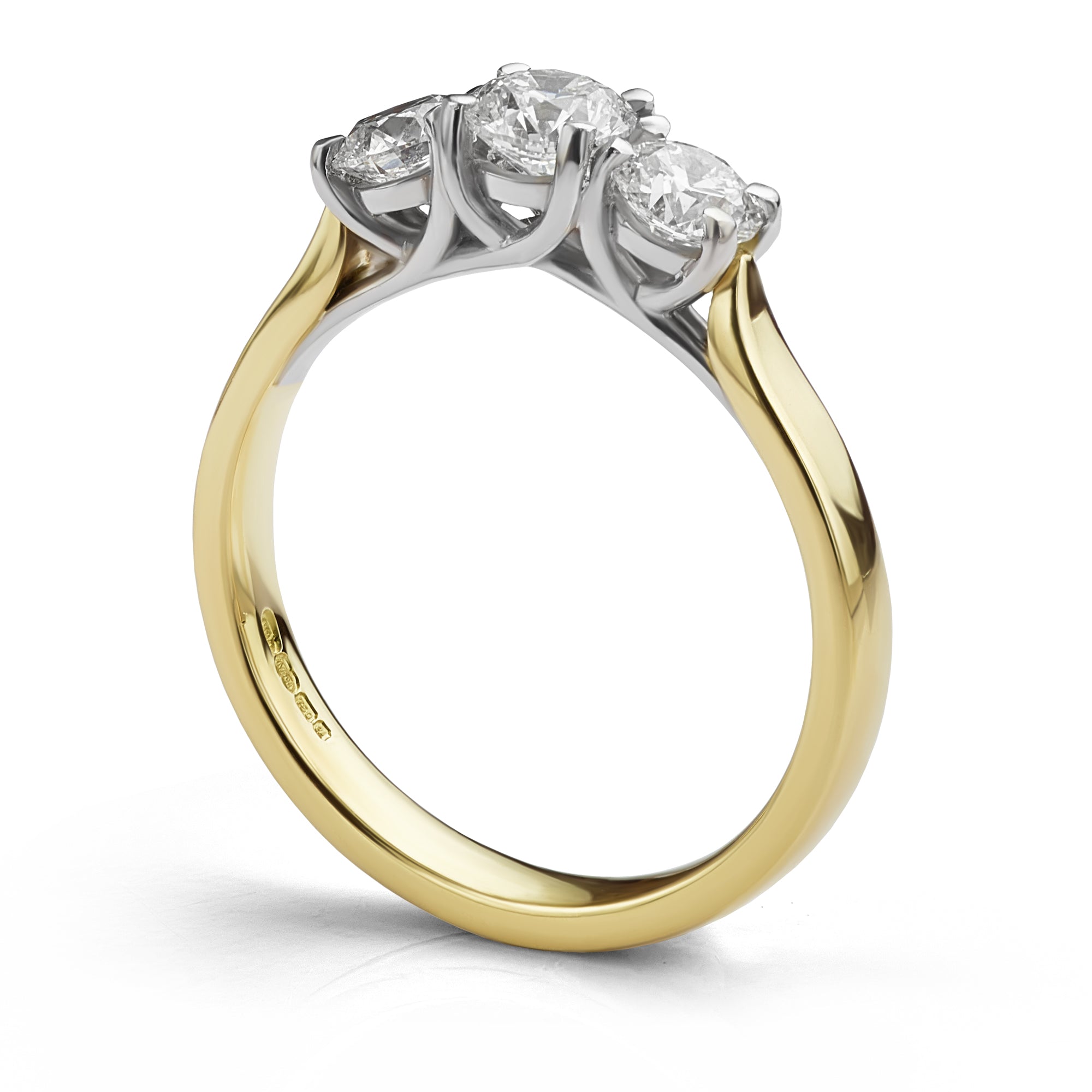 Side view of the 3 stone diamond trilogy ring