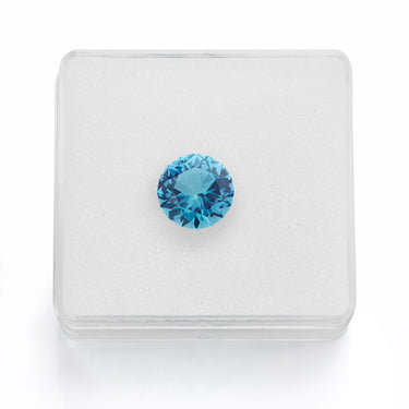 Blue topaz in display box