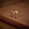 Gold bulldog charm on wood background