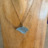 Yellow Gold Isle of Wight shaped sea glass necklace wtih pale blue sea glass. 