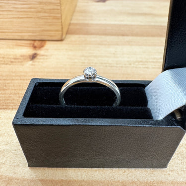 Pre-loved diamond solitaire engagement ring side view