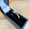 Daisy diamond cluster ring in box