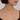 Italian-made 9ct yellow gold multi-strand necklace featuring a woven 9-strand design front view on model