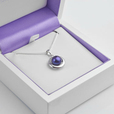 Purple pearl halo necklace shown in the presentation box