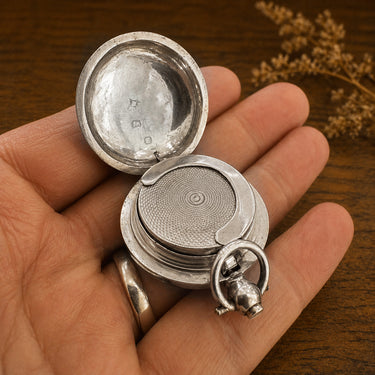 Open view of the silver sovereign holder 1904 Chester