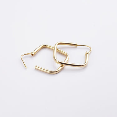 Detailed view of the pre-loved gold squared hoop earrings