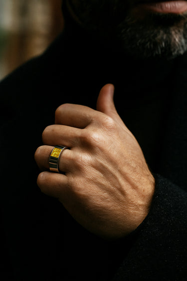 Ashes ring shown on finger 