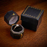 Vintage 18ct Gold & Platinum Diamond Solitaire Ring wood background in ring box