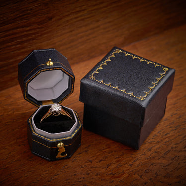 Vintage 18ct Gold & Platinum Illusion Set Diamond Solitaire Ring – 0.40ct on wood background shown in ring box