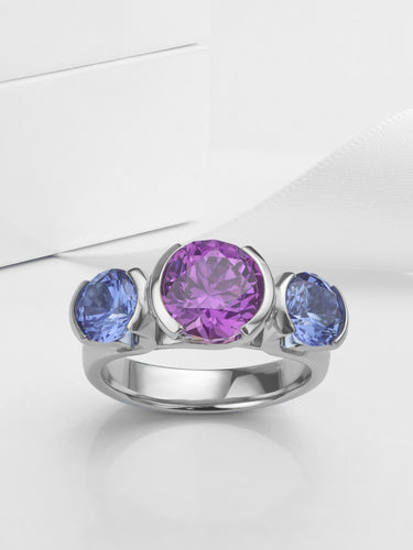 The completed purple and blue sapphire ring design