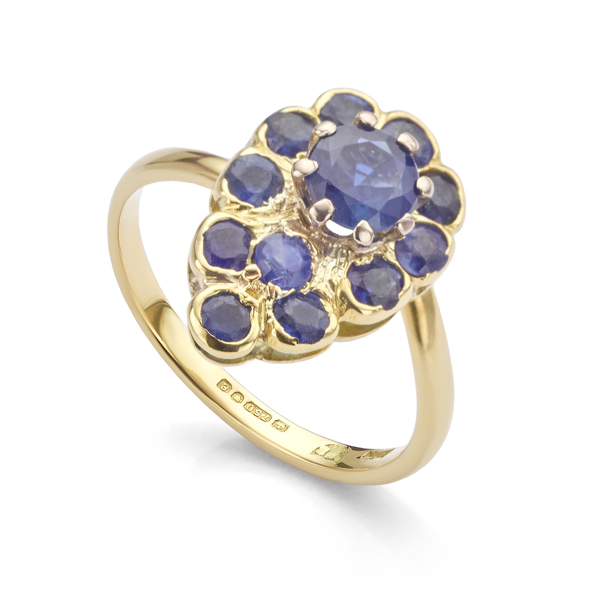 Vintage teardrop blue sapphire cluster ring in yellow gold