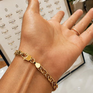 Japanese gold bracelet worn on wrist