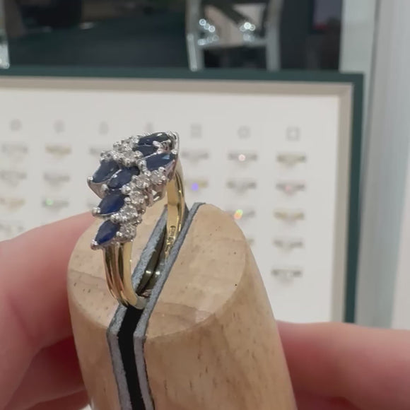 Marquise blue sapphire and cluster pre-loved ring