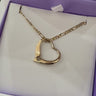Yellow gold open heart necklace pre-loved on figaro chain